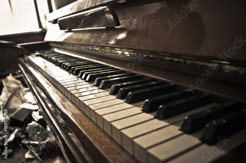 Old abandoned piano keyboard. Close up view