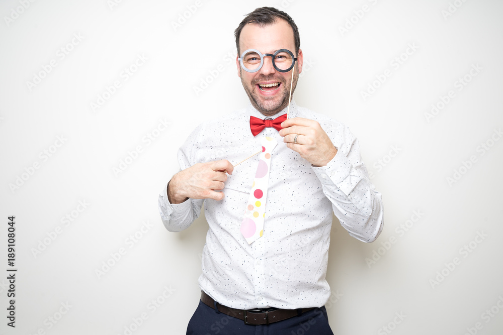 young male man drunk photo booth posing white background props hat