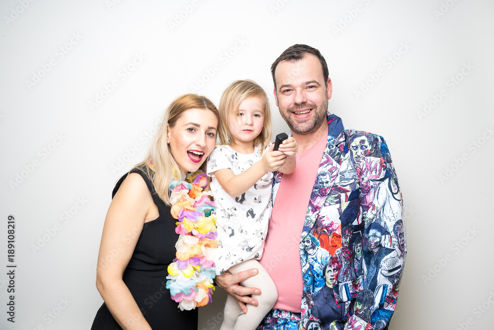 young family posing party photo booth wedding props remote control camera