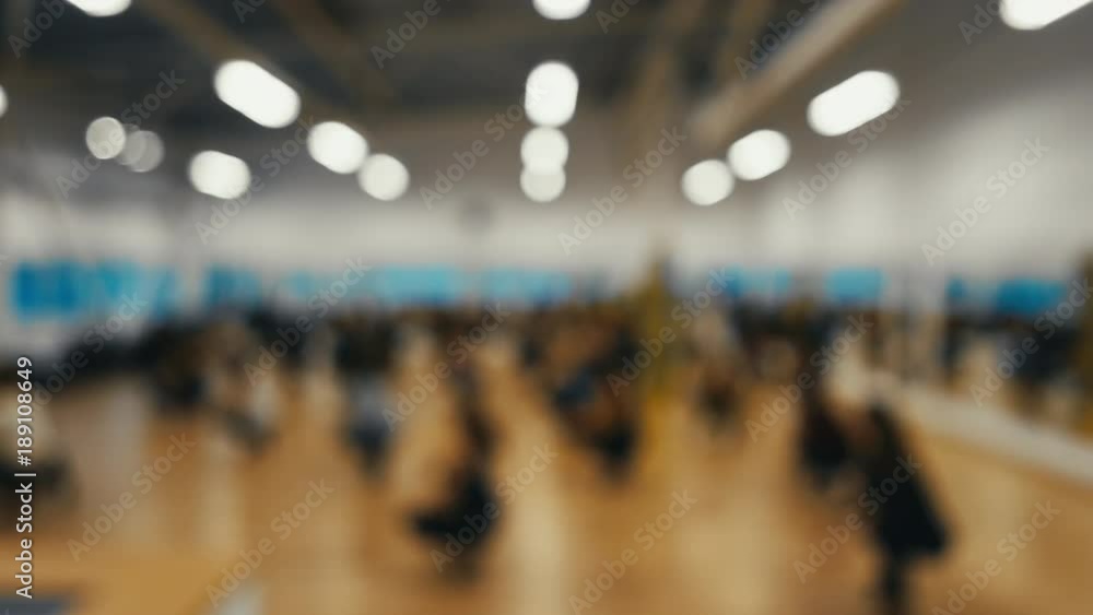 DEFOCUSED BACKGROUND Group of people dancing in a studio. 4K UHD DEFOCUSED BACKGROUND Group of people dancing in a studio. 4K UHD