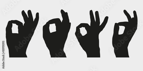 Set of silhouettes of hands showing symbol OK, All right or Very good. Vector illustration.