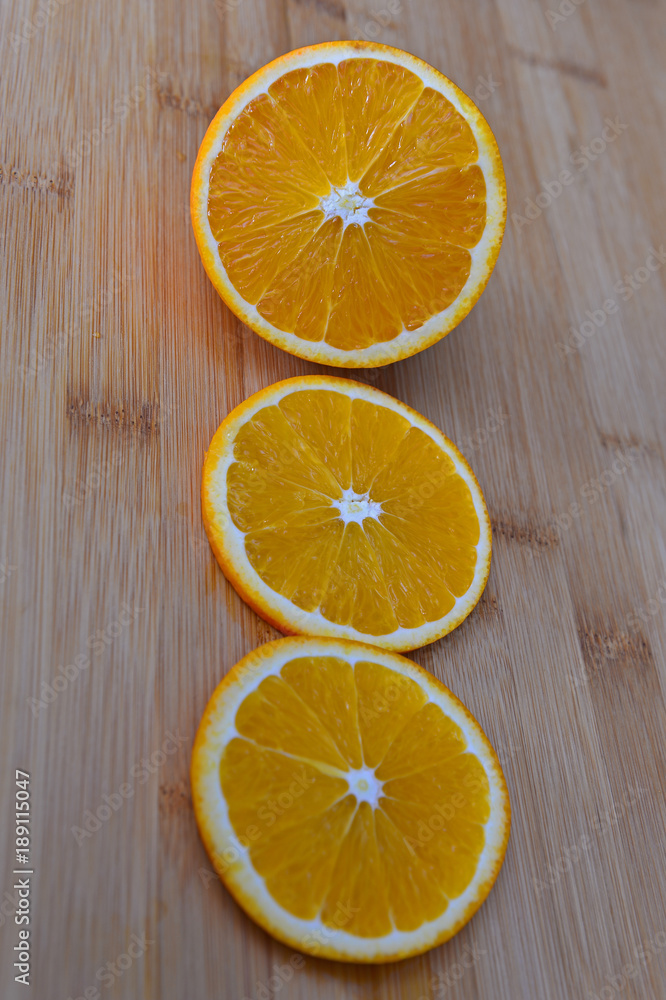 Orange isolated in wooden background Orange isolated in wooden background