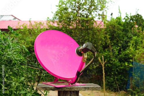 the pink satellite dish with at local village