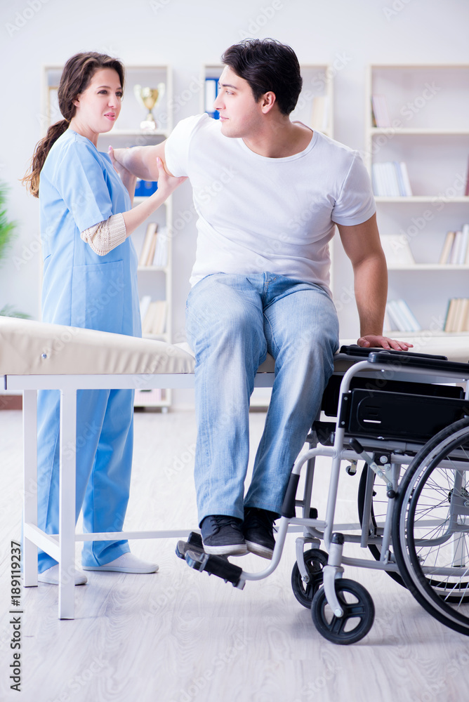 Patient undergoing rehabilitation recovery programme with doctor Patient undergoing rehabilitation recovery programme with doctor