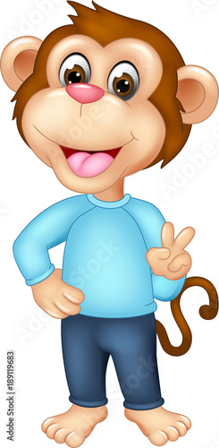 cute monkey cartoon standing with smile and peace photo