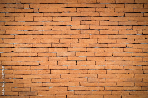 Brown brick wall texture and background with space.