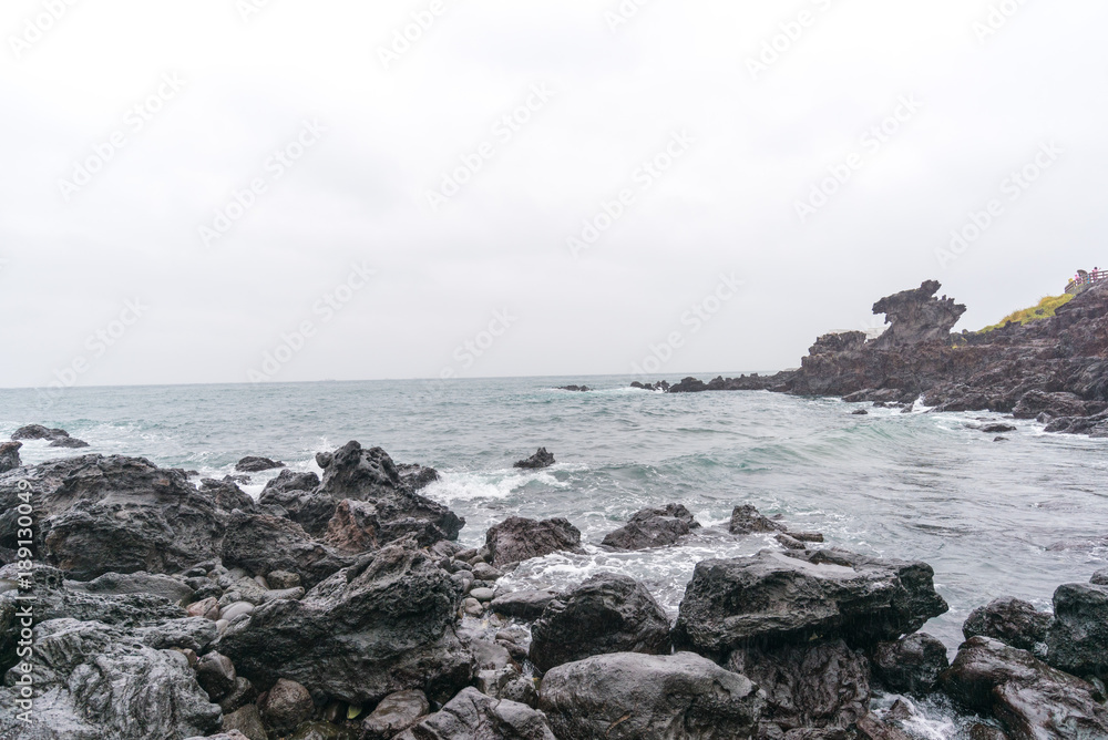 Dragon Head Rock dark or Yongduam of Jeju Island South Korea 