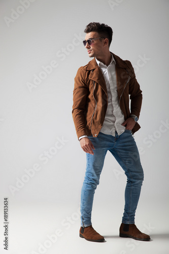 cool fashion man posing with hand in pocket