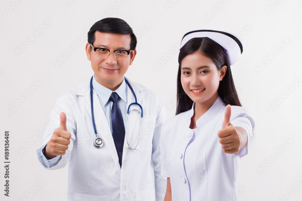 doctor and nurse, medical team giving thumb up doctor and nurse, medical team giving thumb up