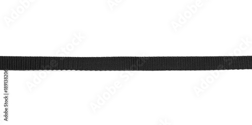 Black nylon belt, strap isolated on white background photo