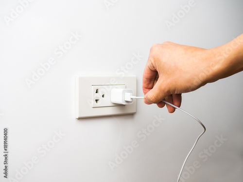 Unplug by pulling wire and cord from socket