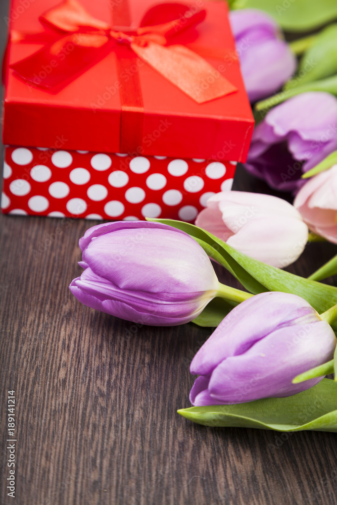 Bouquet of tulips and a gift Bouquet of tulips and a gift