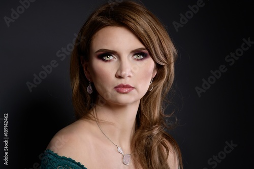 Studio beauty shot of woman with necklace