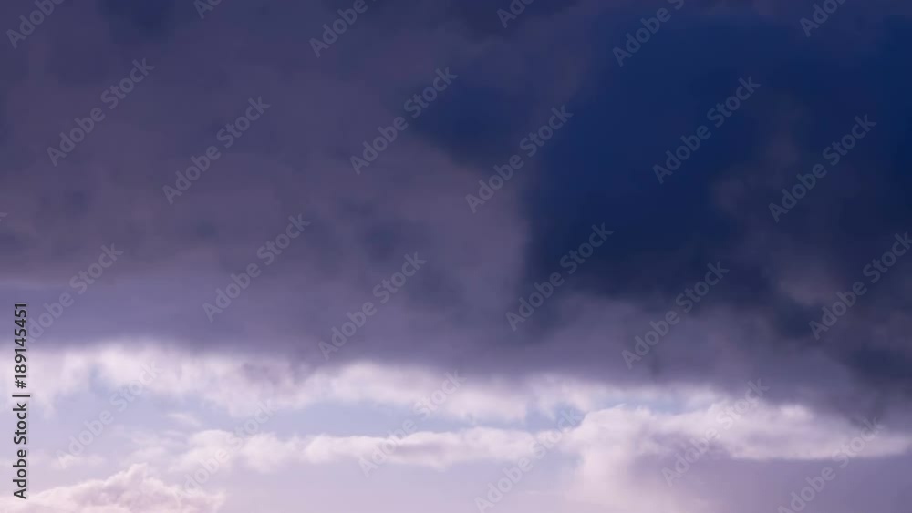 Dark and dramatic storm cloud area background. Time Lapse. Epic storm tropical clouds at sunset. Timelapse 4K UHD. Dark and dramatic storm cloud area background. Time Lapse. Epic storm tropical clouds at sunset. Timelapse 4K UHD.