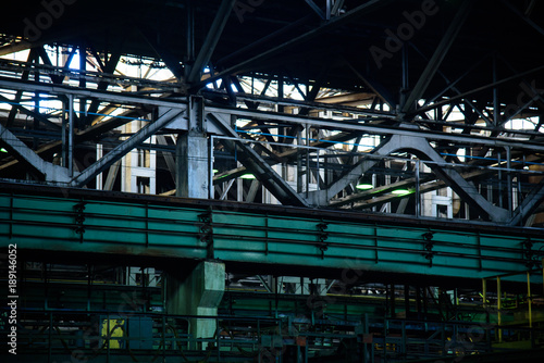 industrial equipment at the factory in production hall close up © Grigorii Postnikov