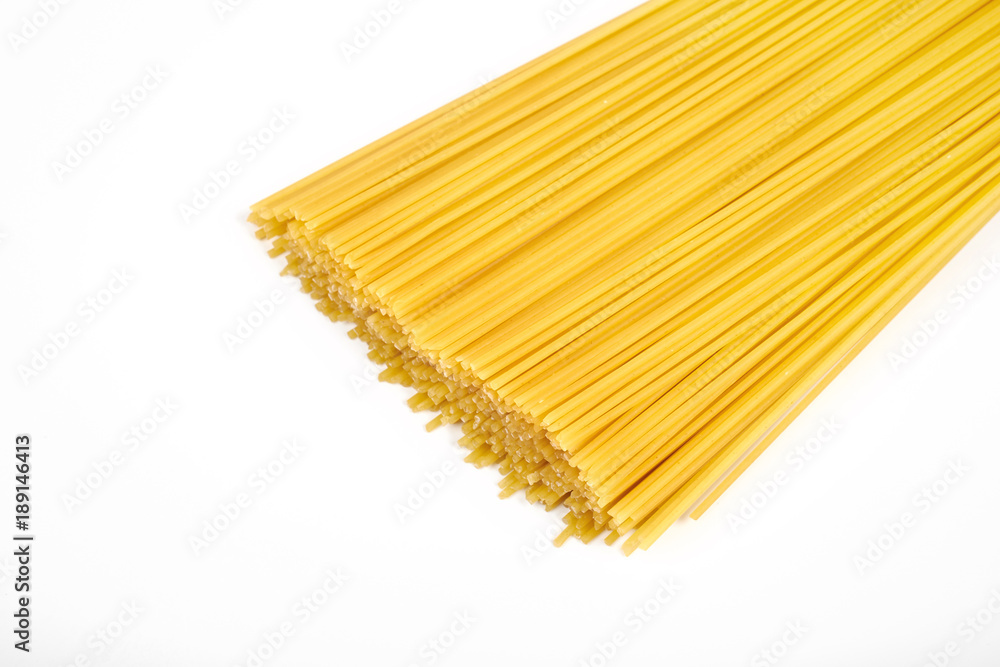Uncooked pasta spaghetti macaroni isolated on white background Uncooked pasta spaghetti macaroni isolated on white background