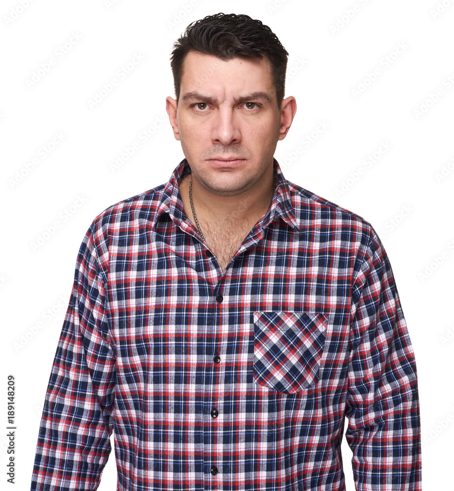 serious man wearing plaid shirt serious man wearing plaid shirt