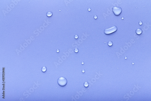 Drops of water on a color background. Gray. Toned