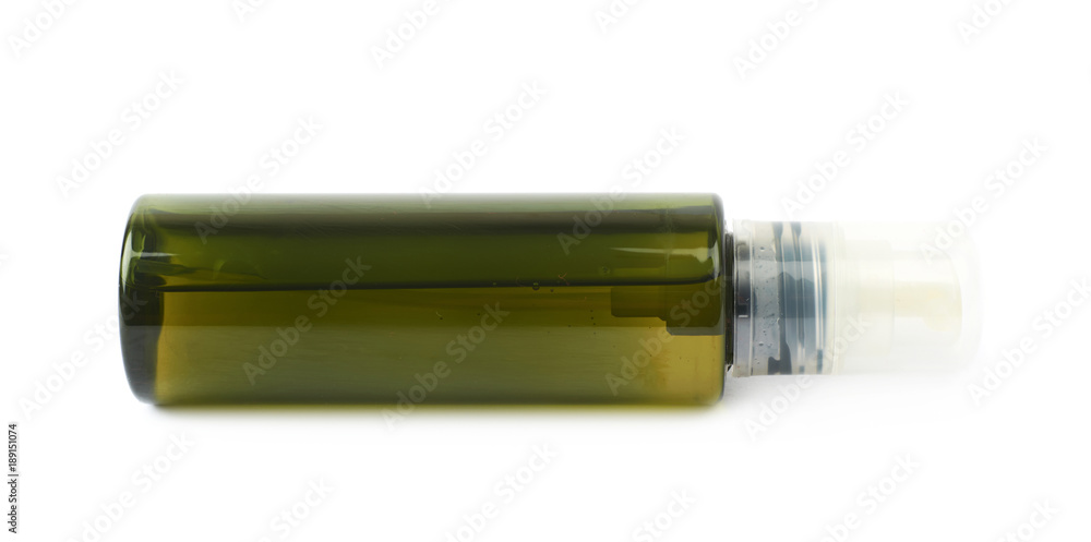 Green massage oil bottle isolated Green massage oil bottle isolated