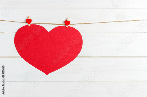 Love paper heart on string. Valentine day concept, copy space photo