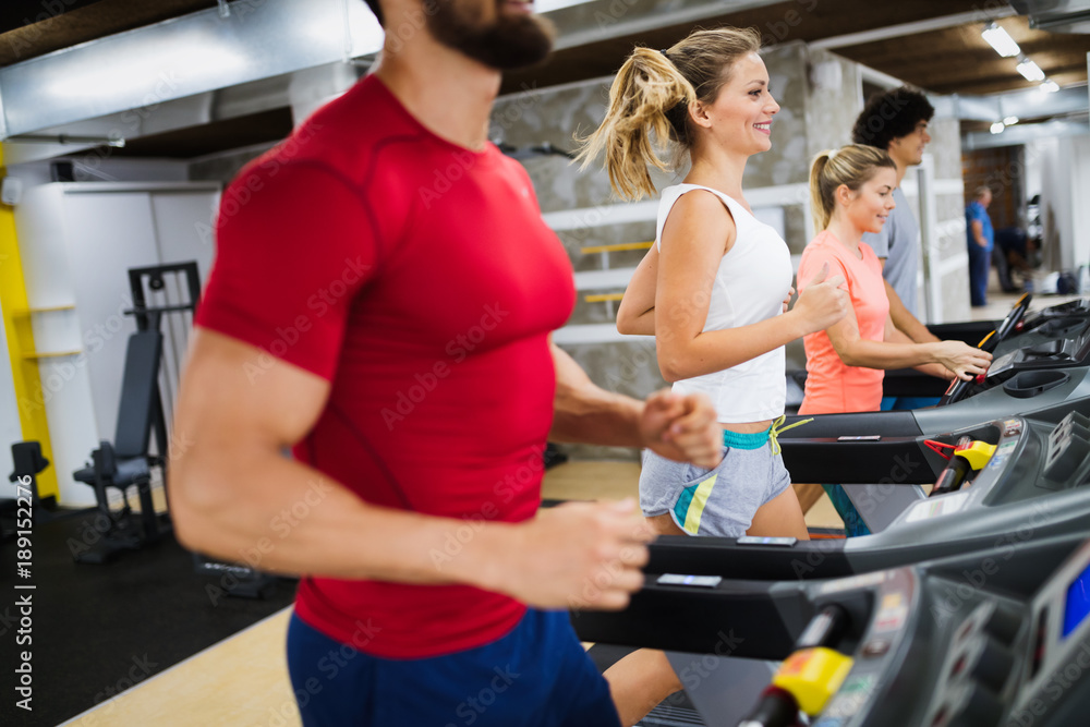 Picture of people running on treadmill in gym Picture of people running on treadmill in gym