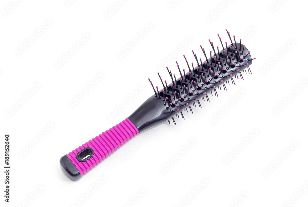 Hairbrush with plastic bristles on a white background Hairbrush with plastic bristles on a white background