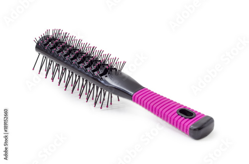 Vented plastic hairbrush with plastic bristles on a white background