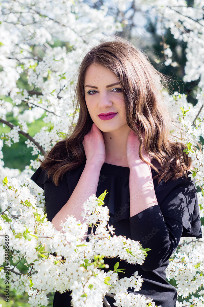 Beautiful young girl in the park in the spring. Beautiful young girl in the park in the spring.
