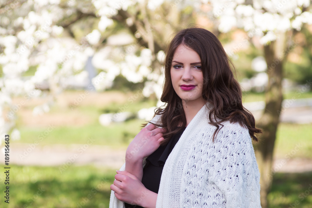 Beautiful young girl in the park in the spring. Beautiful young girl in the park in the spring.