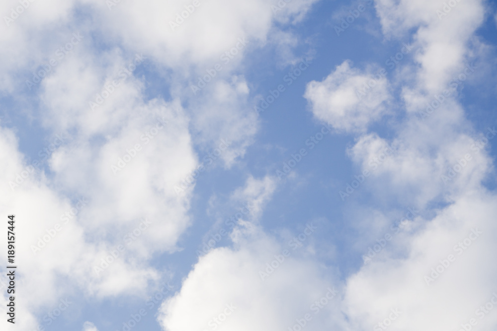 Helicopter flying over a clouds height with blue sky background . Helicopter flying over a clouds height with blue sky background .