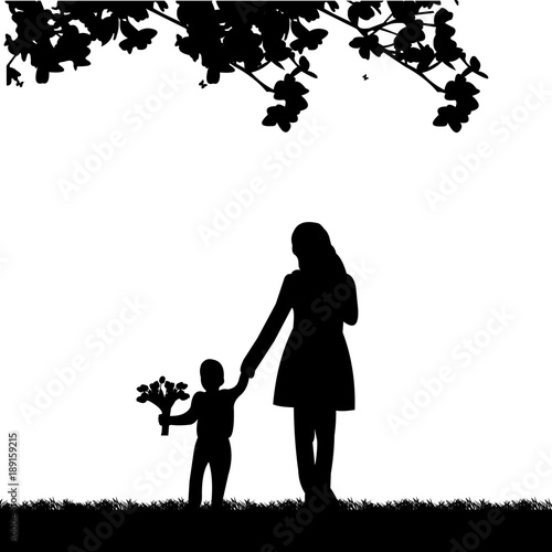 Mother walks with a son with flowers in the park, one in the series of similar images silhouette