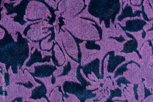 The texture of the purple velvet fabric