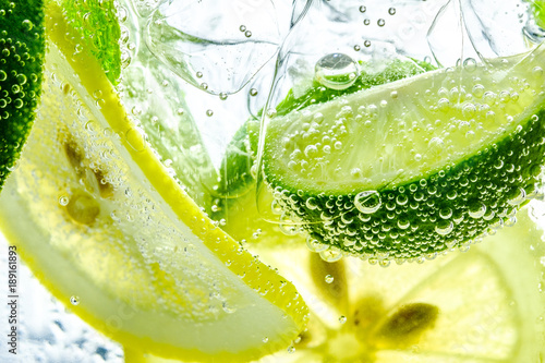 Lemon drop in fizzy sparkling water, juice refreshment