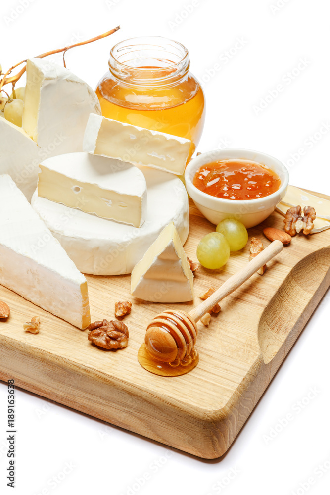 pile of brie or camambert cheese on white background pile of brie or camambert cheese on white background