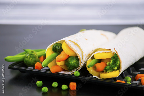 Pita bread stuffed with vegetables and asparagus, healthy breakfast