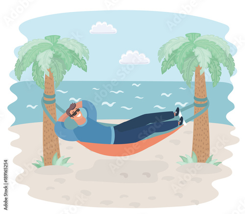 A young man on the beach relaxing 