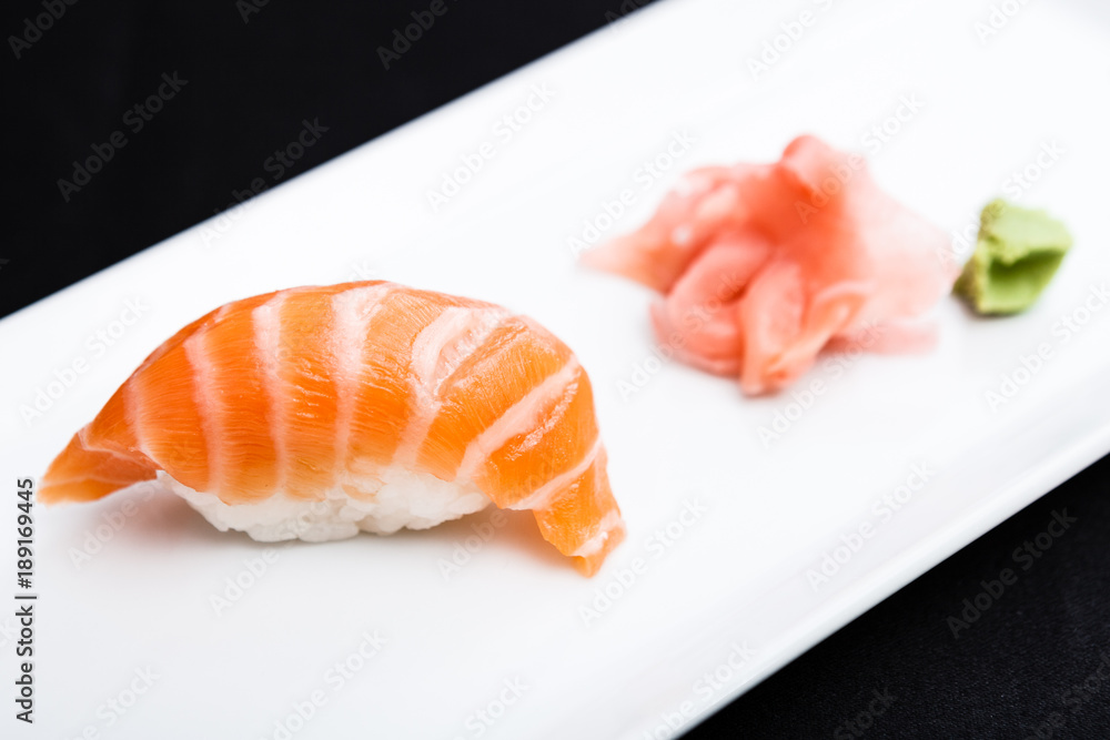 Salmon sushi served on a plate Salmon sushi served on a plate
