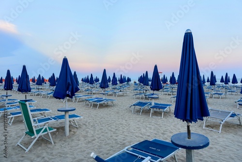 Beach with blue umbrellas © Radosław Czapla