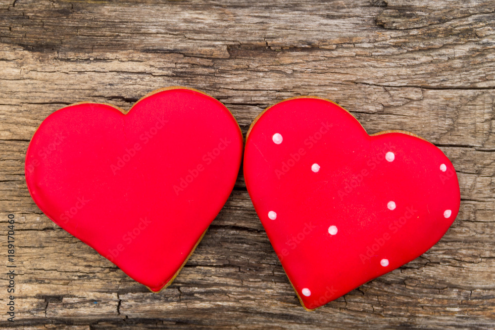Heart shaped cookie for valentine day on rustic wooden table Heart shaped cookie for valentine day on rustic wooden table