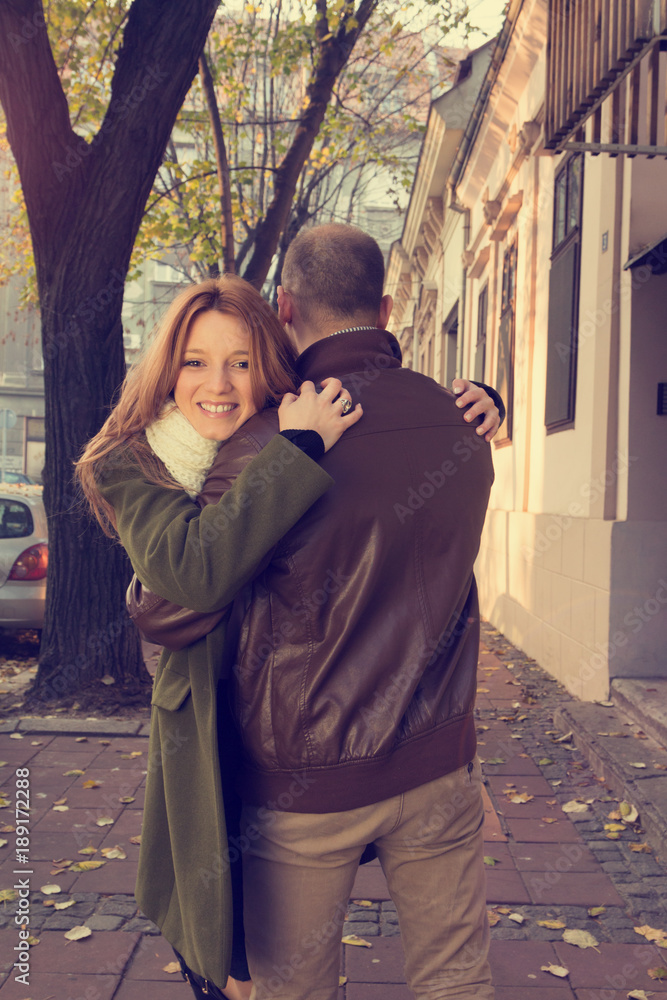 Couple in love having fun on the old European street. Love concept. Couple in love having fun on the old European street. Love concept.