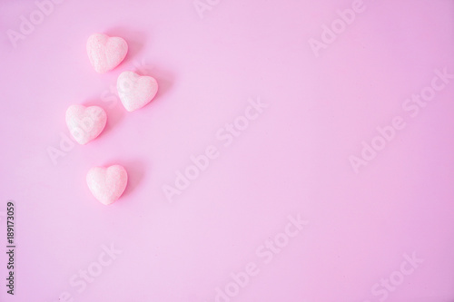 The 14th of February. St. Valentine's Day. Background with fluffy pink hearts on a pink background. Top view with copy space