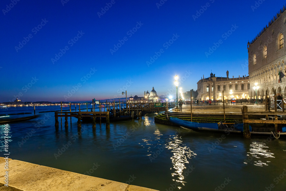 VENICE, ITALY - JANUARY 02 2018: night view of San Marco Basin, with Basilica della Salute and Giudecca Island background