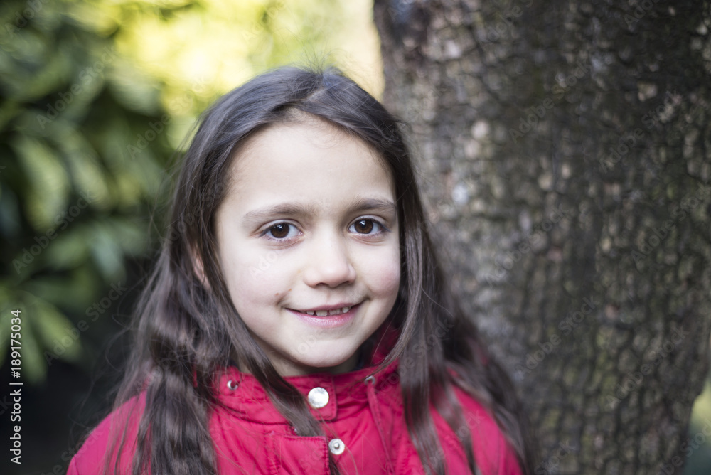 portrait of a little girl of 7 years on the outside portrait of a little girl of 7 years on the outside