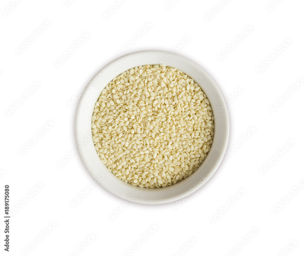 Sesame on white background. Top view. Sesame in a bowl isolated on white background. Sesame with copy space for text. Sesame on white background. Top view. Sesame in a bowl isolated on white background. Sesame with copy space for text.