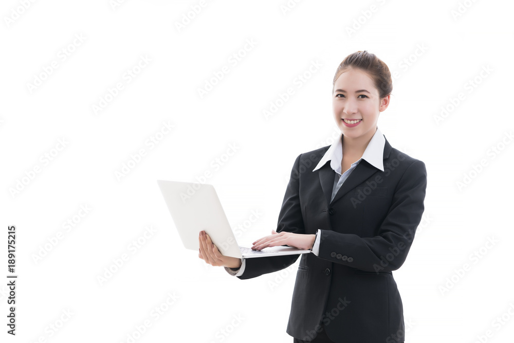 Business concept : Smiling young Asian businesswoman in black suit and white shirt holding laptop isolated on white background Business concept : Smiling young Asian businesswoman in black suit and white shirt holding laptop isolated on white background