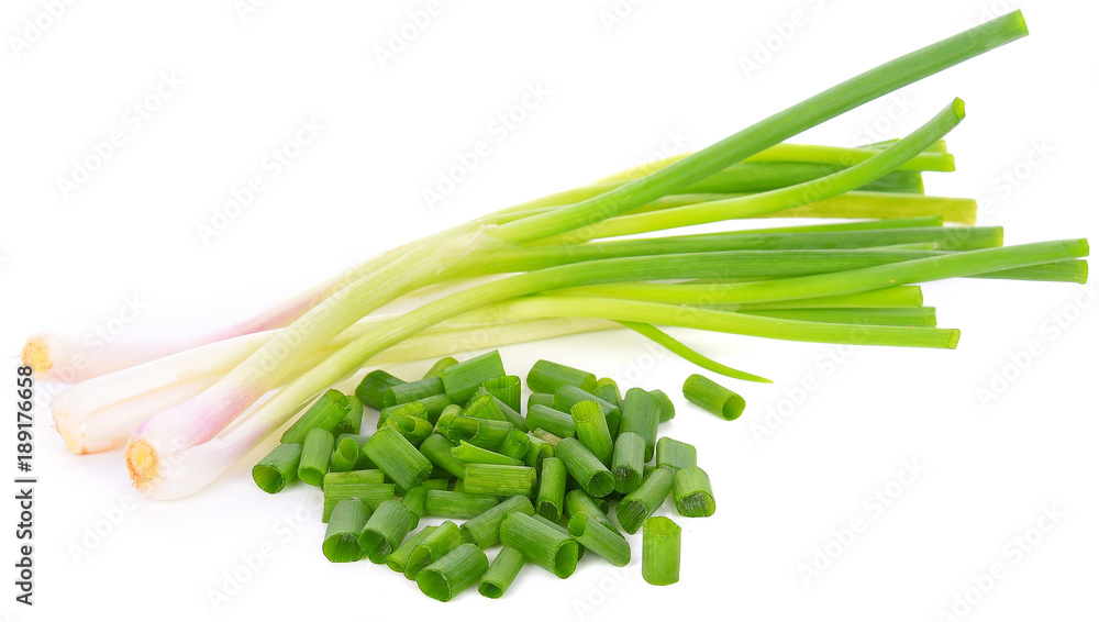 heap of chopped spring onions isolated on white background