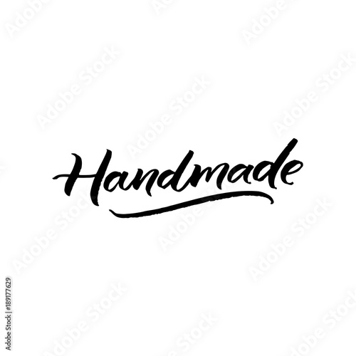 Handmade word isolated on white background. Calligraphy inscription label for hand crafted products