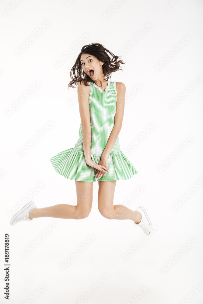 Full length portrait of a funny girl dressed in dress Full length portrait of a funny girl dressed in dress
