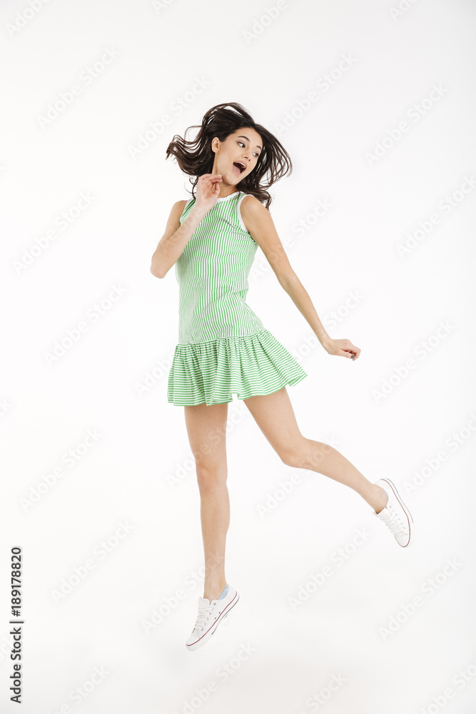 Full length portrait of a pretty girl dressed in dress Full length portrait of a pretty girl dressed in dress
