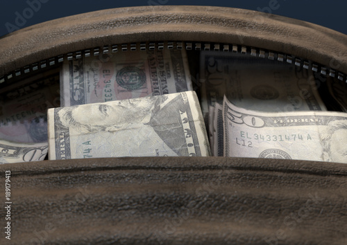 Illicit Cash In A Brown Duffel Bag
